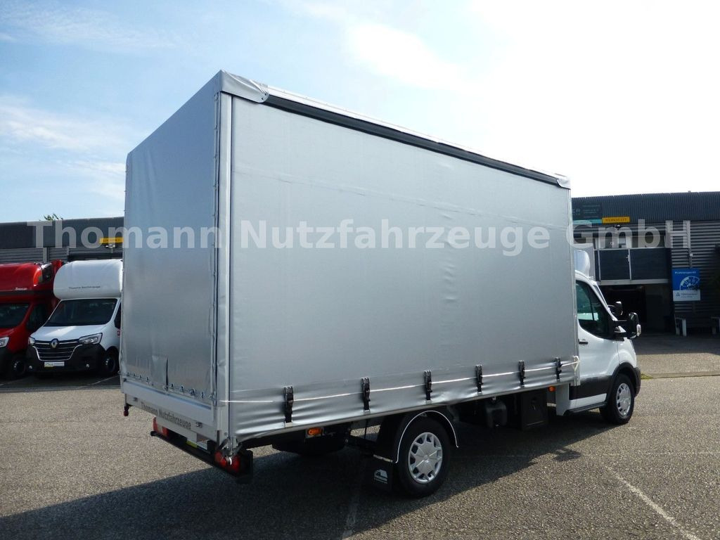 Ford Transit Pritsche Plane 4,25m Klima Temp. DAB Ford Transit Pritsche Plane 4,25m Klima Temp. DAB - Furgoneta con caja de lona: foto 4 Ford Transit Pritsche Plane 4,25m Klima Temp. DAB Ford Transit Pritsche Plane 4,25m Klima Temp. DAB - Furgoneta con caja de lona: foto 4