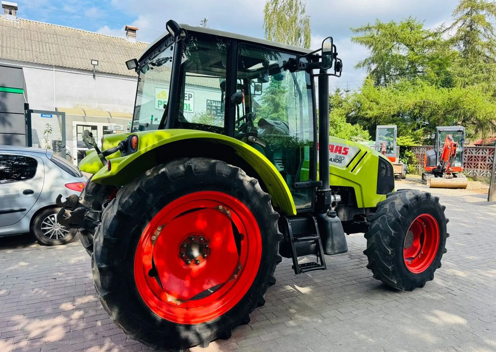 Tractor Claas Axos 330: foto 7