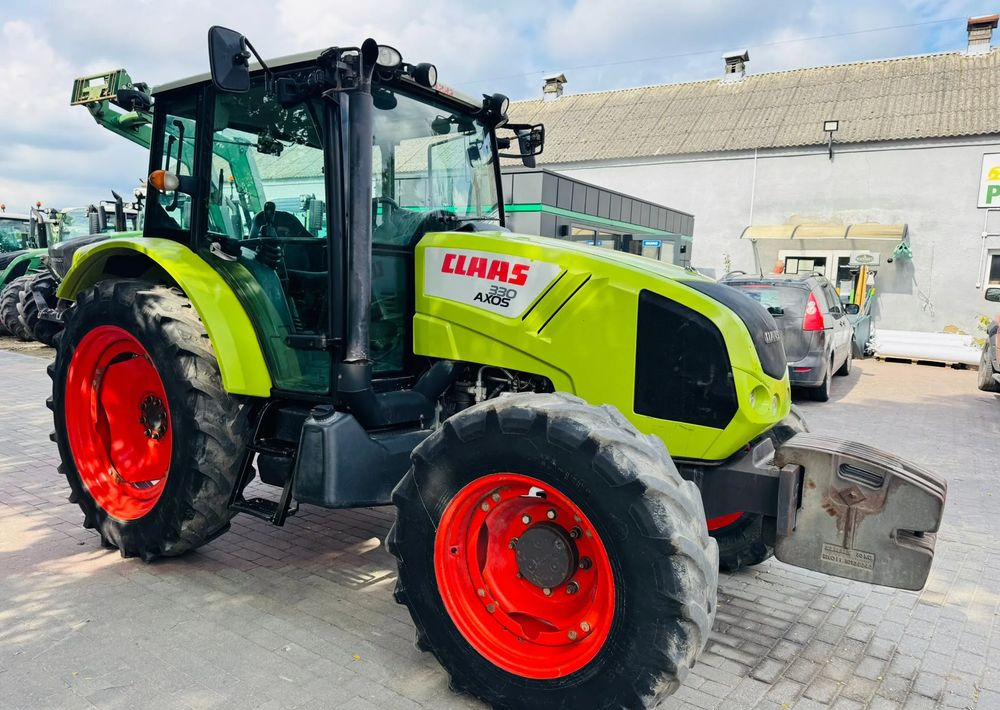 Tractor Claas Axos 330: foto 9