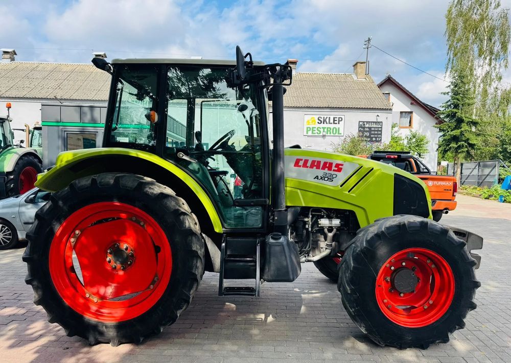 Tractor Claas Axos 330: foto 8 Tractor Claas Axos 330: foto 8