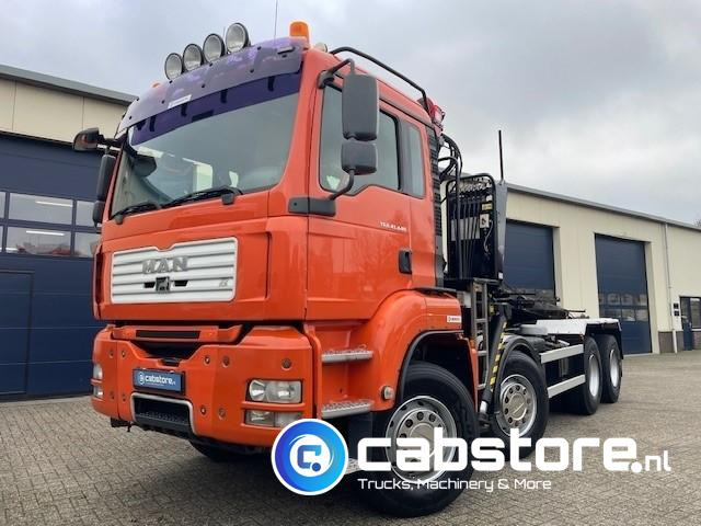 MAN TGA 41.440 8X4 BB Palfinger Epsilon Z-Kraan bouwjaar 2011 + NCH 30 Ton's Kabel-containersyteem - Handgeschakeld - Bouwjaar 2007 - Km 582.782 - Camión grúa: foto 1 MAN TGA 41.440 8X4 BB Palfinger Epsilon Z-Kraan bouwjaar 2011 + NCH 30 Ton's Kabel-containersyteem - Handgeschakeld - Bouwjaar 2007 - Km 582.782 - Camión grúa: foto 1