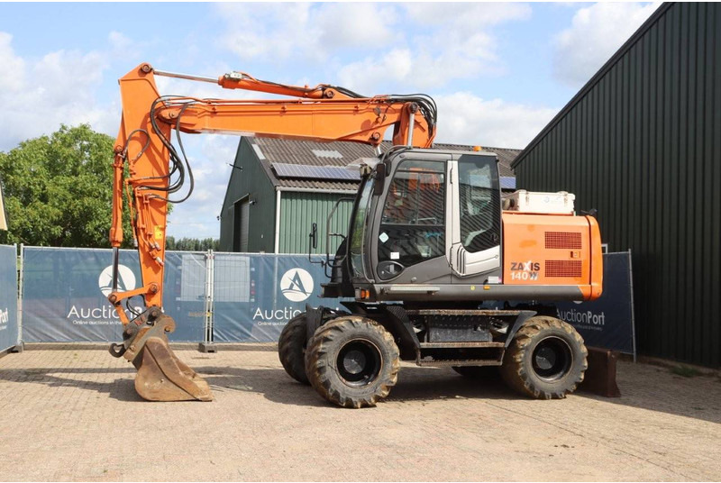 Hitachi ZX140W-3 - Excavadora de ruedas: foto 1 Hitachi ZX140W-3 - Excavadora de ruedas: foto 1