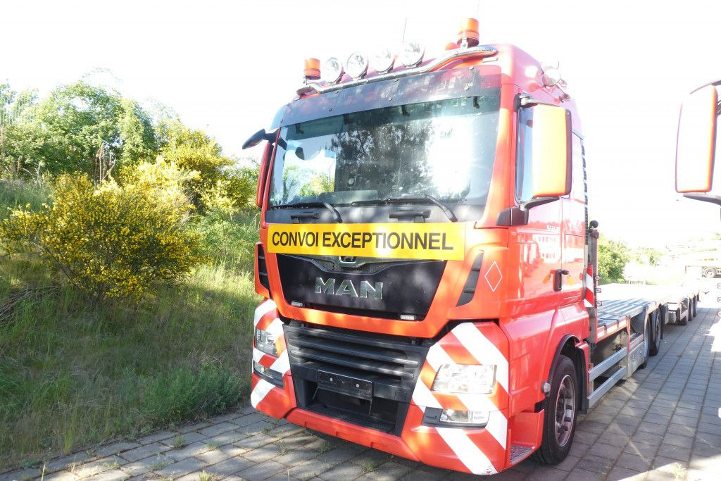 MAN TG-X 24.500 6x2-4 LL-U Pritsche Maschinentranspo - Camión caja abierta: foto 4 MAN TG-X 24.500 6x2-4 LL-U Pritsche Maschinentranspo - Camión caja abierta: foto 4