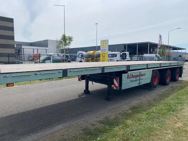 Floor robuuste vlakke oplegger ,uitschuifbaar, ,stuurassen, 20 mtr met stalen bodem/frame. kranenprofiel. - Semirremolque plataforma/ Caja abierta: foto 3 Floor robuuste vlakke oplegger ,uitschuifbaar, ,stuurassen, 20 mtr met stalen bodem/frame. kranenprofiel. - Semirremolque plataforma/ Caja abierta: foto 3